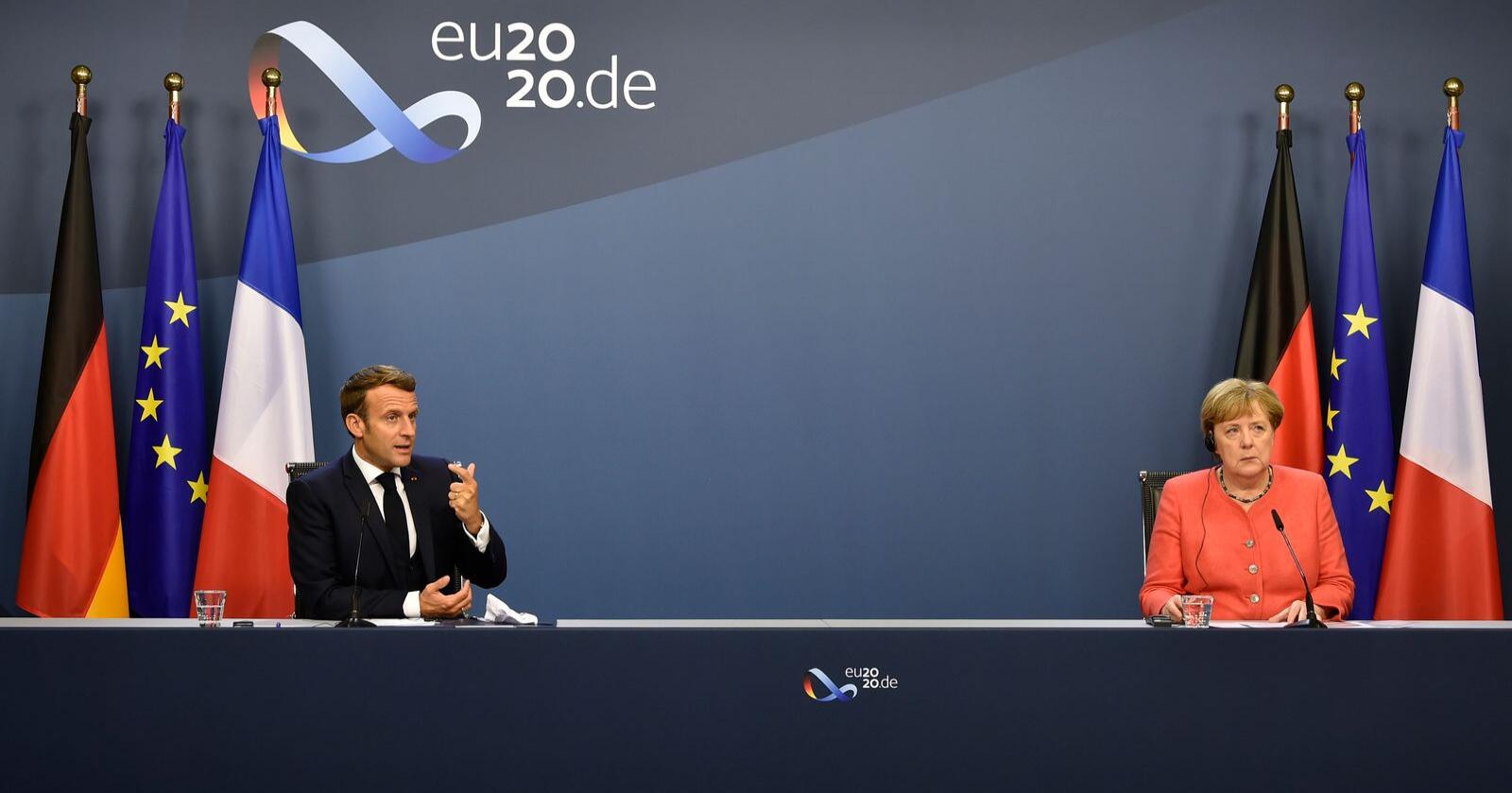 Korona: Tysklands Rikskanseler Angela Merkel og den franske presidenten Emmanuel Macron la fram en korona-krisepakke tirsdag 21. juli. Foto: John Thys / AP / NTB scanpix